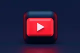 YouTube logo in front of a dark background
