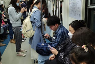 Wearing masks on the Beijing subway is no longer compulsory