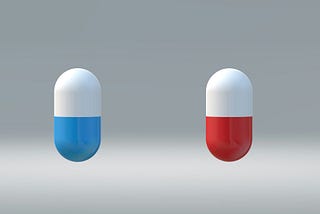 Two pills that represent the choice to the electorate this year — alt text to boost Medium stories.