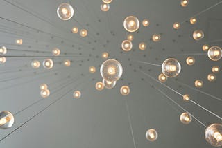 Light bulbs suspended from the ceiling.