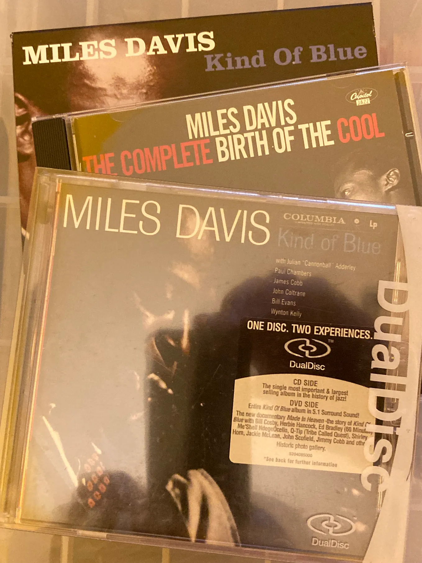 Author’s photo of their copies of the Miles Davis CD albums Kind of Blue on both Not Now and the Dual Disc version from Columbia Legacy, and The Complete Birth of the Cool on Capitol