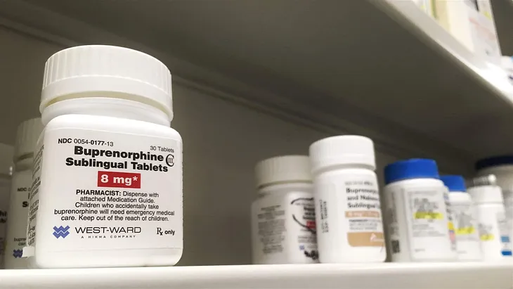 a pharmacy shelf with buprenorphine 8 mg in the foreground