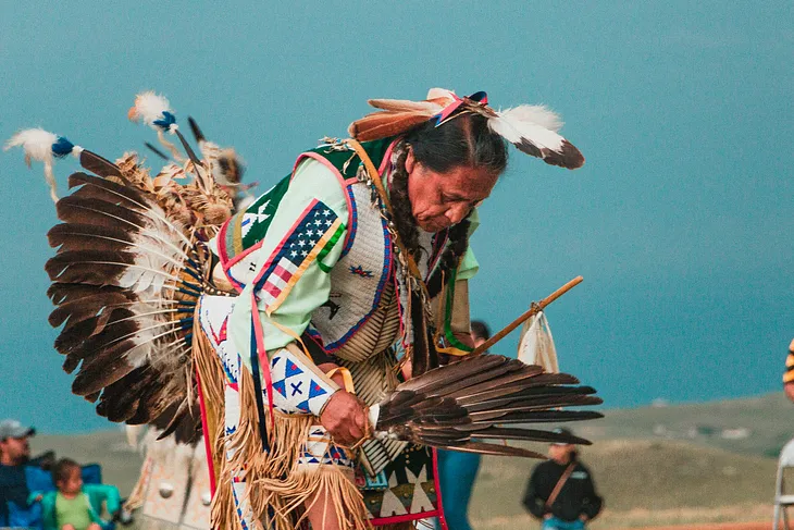 Native American elder in powwow regalia